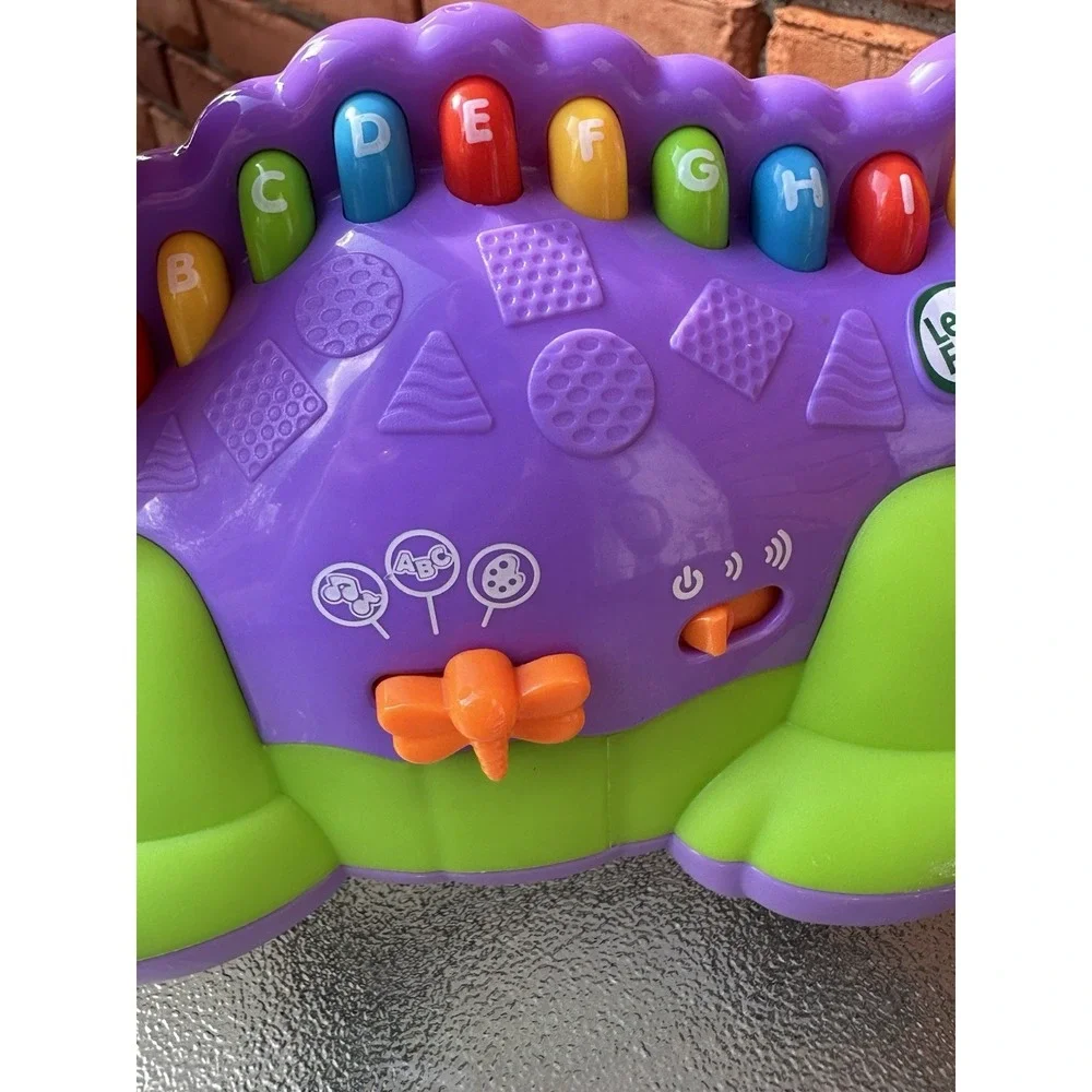 2010 Leap Frog Lettersaurus Purple Dinosaur Lights Songs Interactive Letters‎